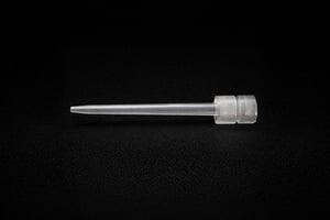 Long capillary-style custom sapphire part with a polished connector end, highlighting high-precision machining.